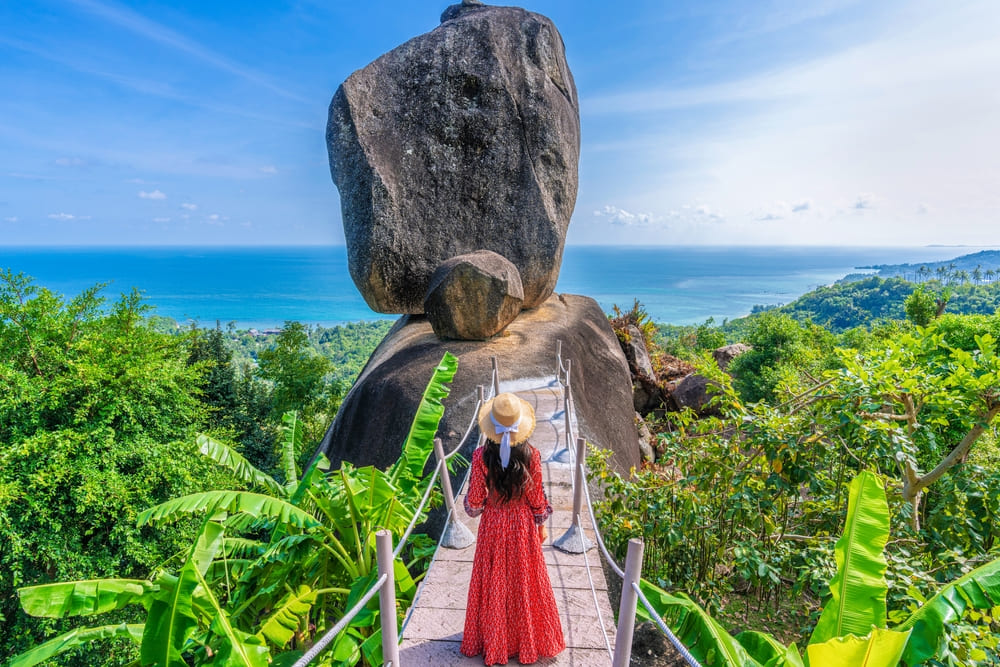 Woman Standing in Red Dress