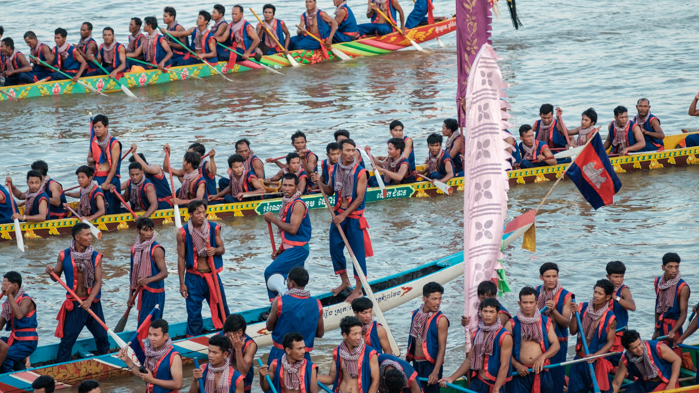 Phnom Penh, Cambodia - November 21 2018: Cambodians on their dragon boats as they awaits the boat race to begin as part of the Bon Om Touk or Water Festival.