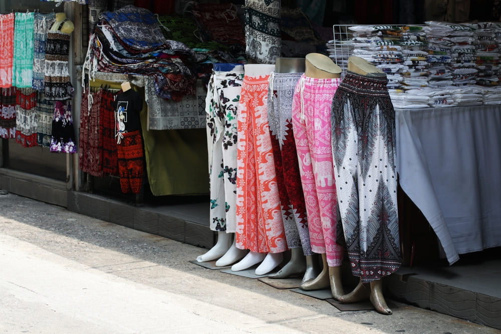 Stylish flowy trousers on mannequins