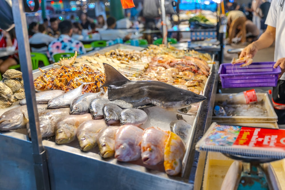 Seafood vendor at Banzaan night market