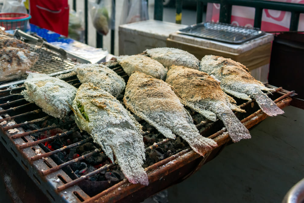 Grilled whole fish with a salted crust