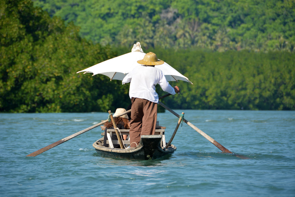 Person rowing on boat in Ban Salak Khok, Trat
