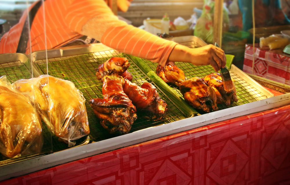 Grilled duck and chicken at market next to Sukhothai Historical Park
