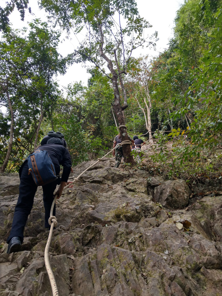 Hiking up the waterfall at Khap Phanom Bencha National Park