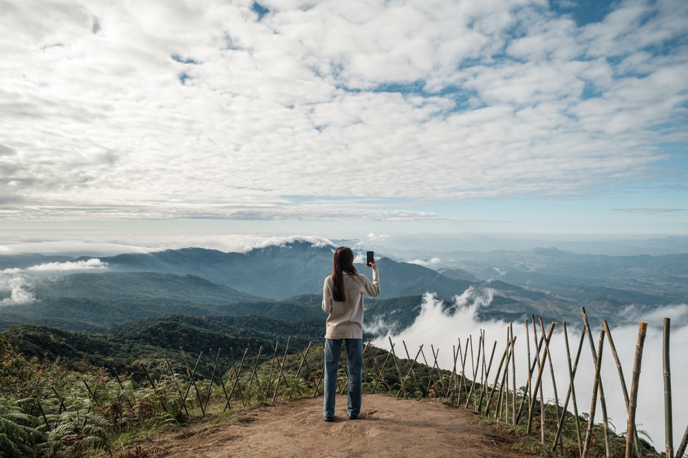 Woman taking photos at Doi Inthanon