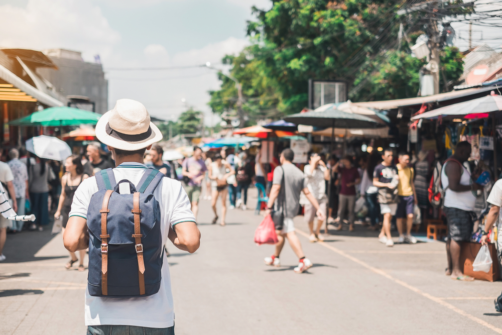 Man standing at Chatuchak Weekend Market in Bangkok