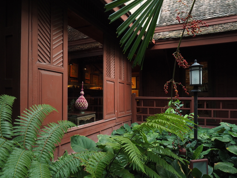 A corner of the outside of Jim Thompson House with plants