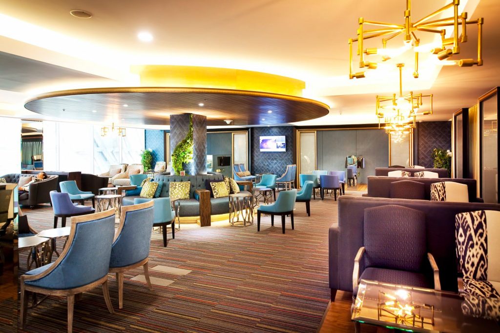 Interior view of Bangkok Airways Blue Ribbon Club Lounge featuring an elegant design.