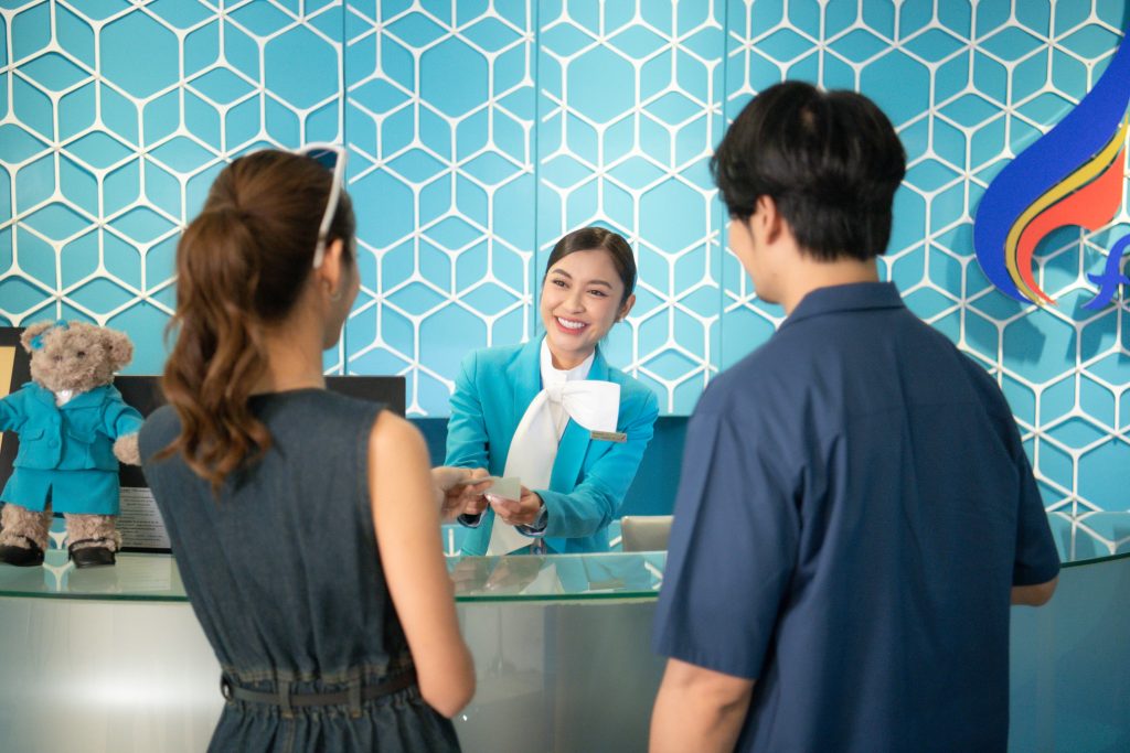 Economy Class passengers enjoying complimentary access to the Bangkok Airways Boutique Lounge.
