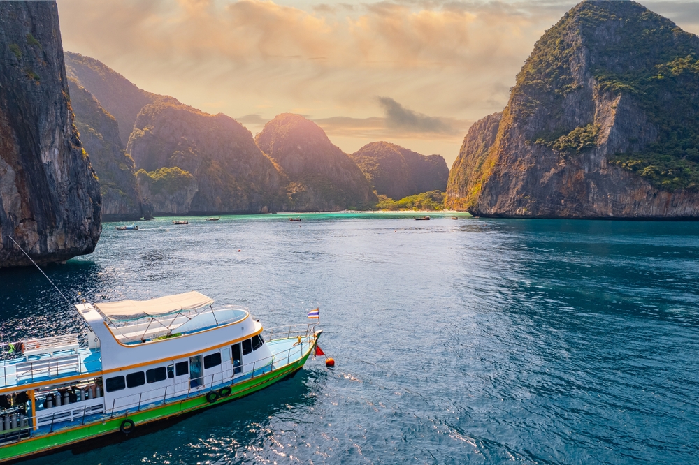 Ferry on Phi Phi Leh going to Maya Bay during sunset