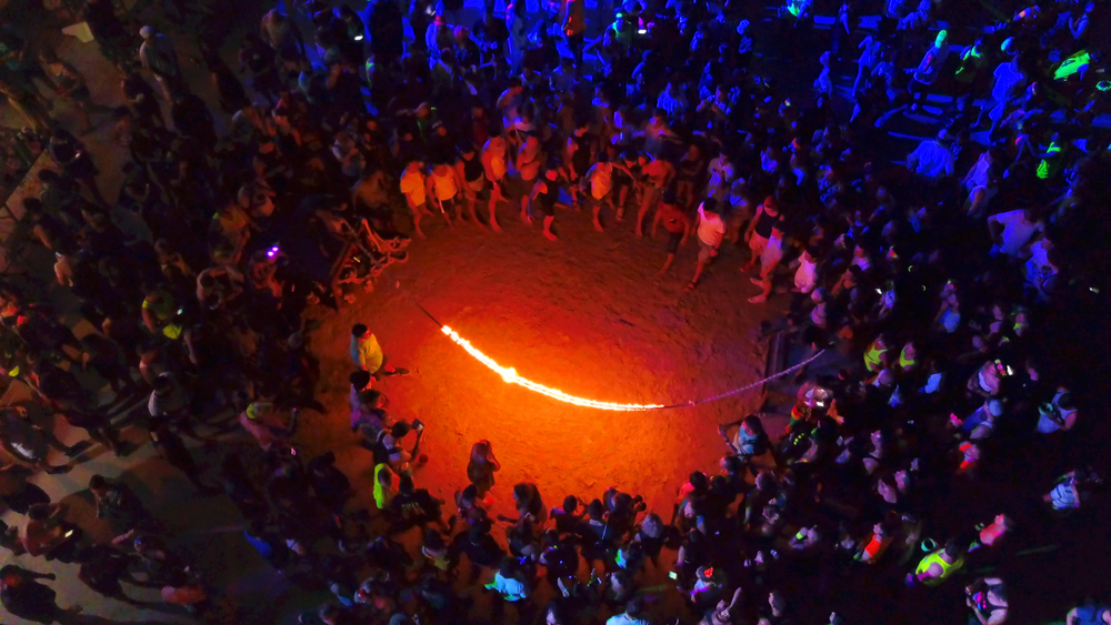 A fire-rope jumping performance at the Full Moon Party on Koh Phangan