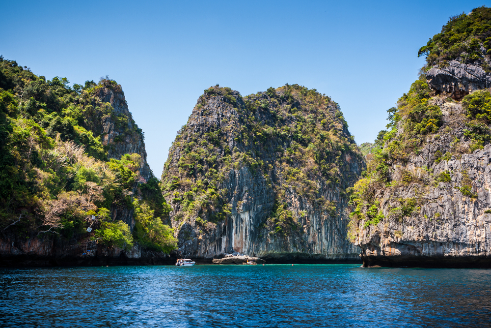 Towering cliffs over the seawater at Loh Samah Bay in Koh Phi Phi