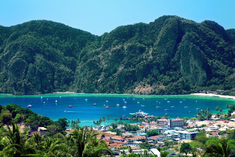 High view of Ton Sai Bay with turquoise seawaters and green mountains in the back