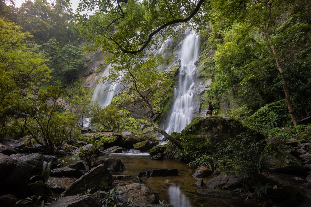 Khlong Lan Waterfall in Kamphaeng Phet, a majestic waterfall in Thailand showcasing a massive stream plunging from a high cliff.