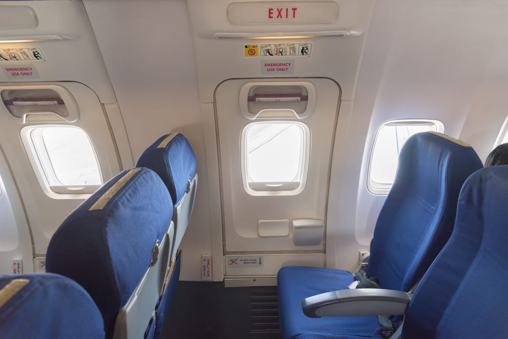 Bangkok Airways Extra Legroom seats located next to the aircraft emergency exit door.