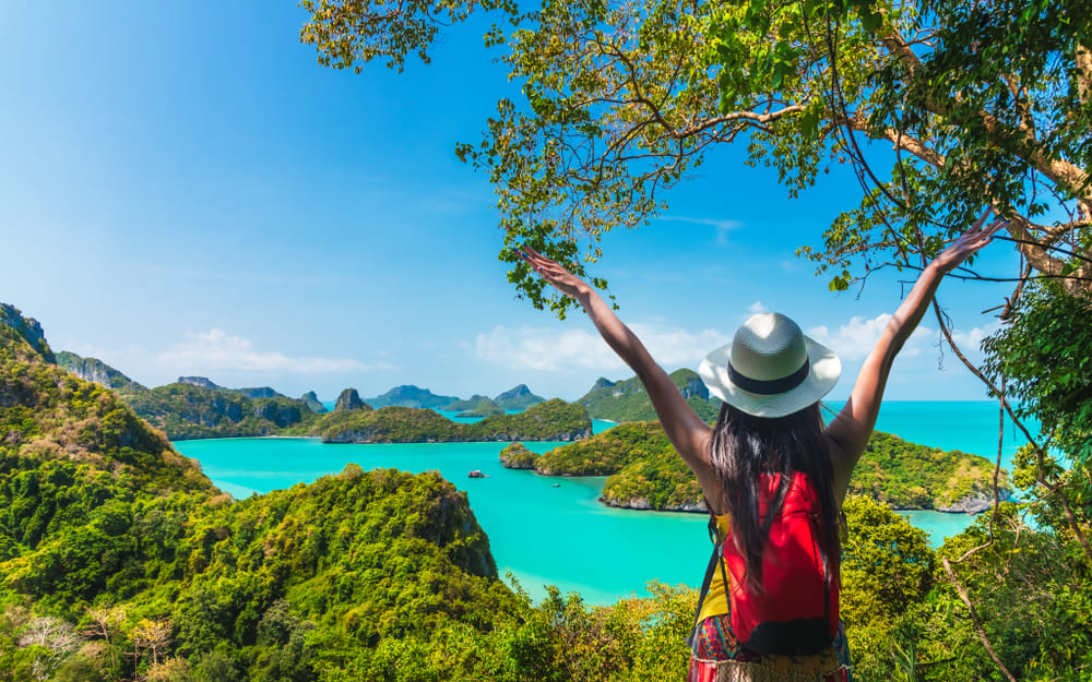 the crystal clear beach, experiencing slow travel in Thailand.