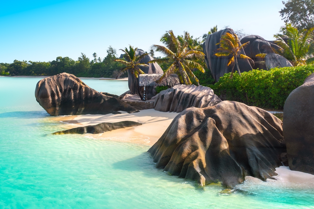 Iconic granite boulders and clear waters in Seychelles, one of the best islands in the world.