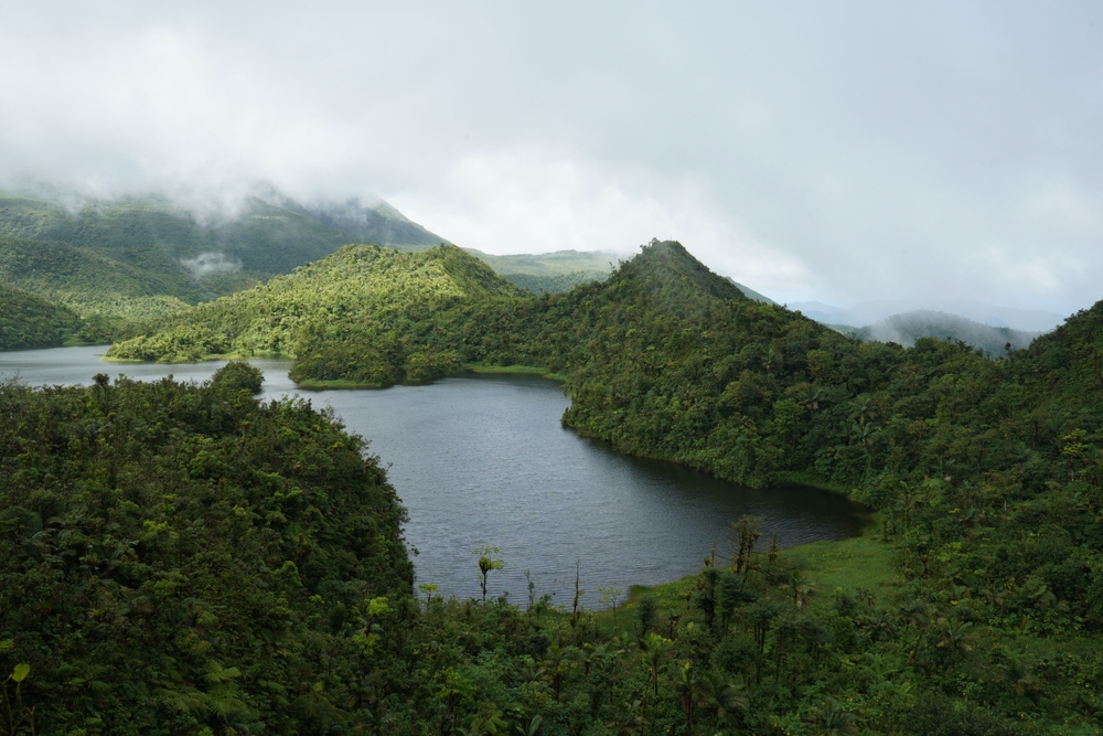Lake and lush mountains at Morne Trois Pitons National Park in Dominica, one of the best islands in the world.