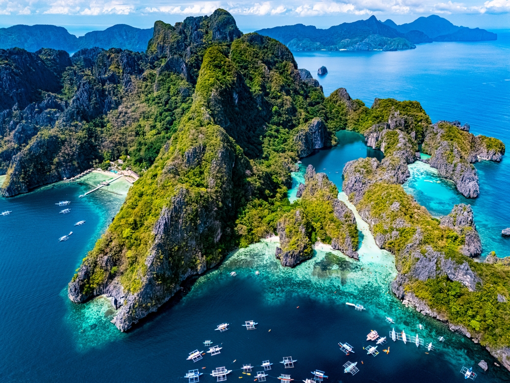 Spectacular limestone cliffs and clear waters in Palawan, the Philippines, during the rainy season in Southeast Asia.
