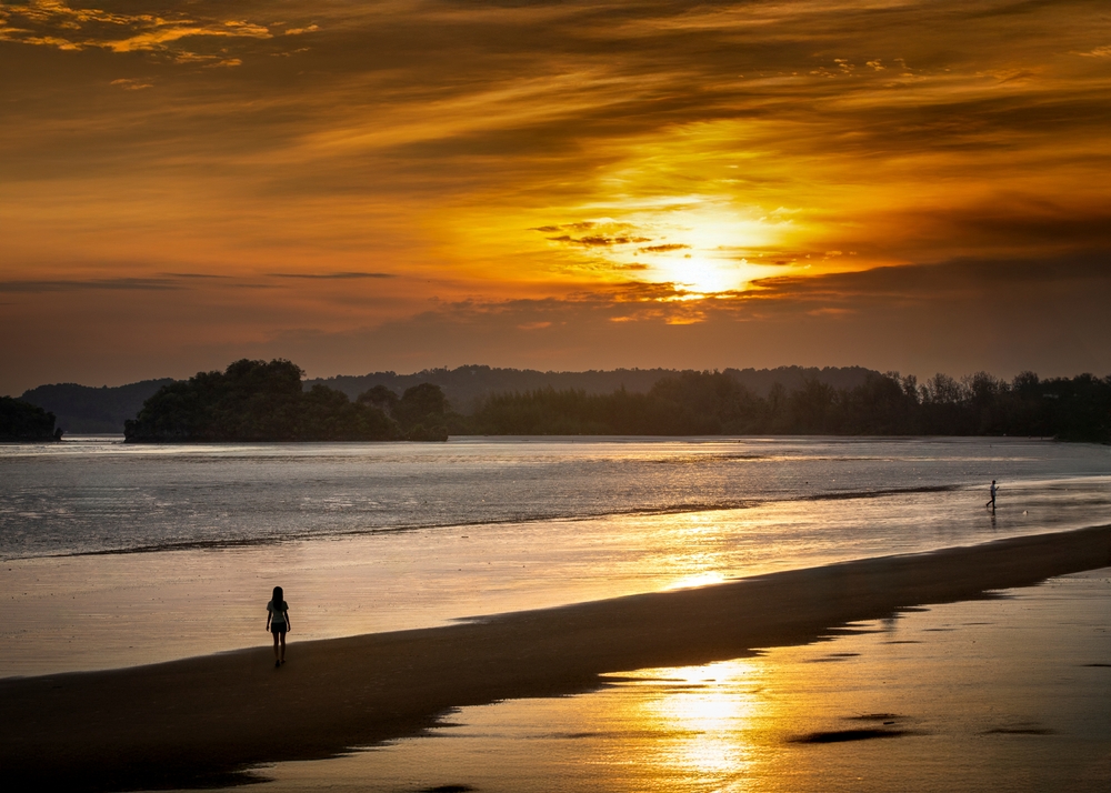A romantic sunset over the Andaman Sea at Ao Nang Beach, Thailand.