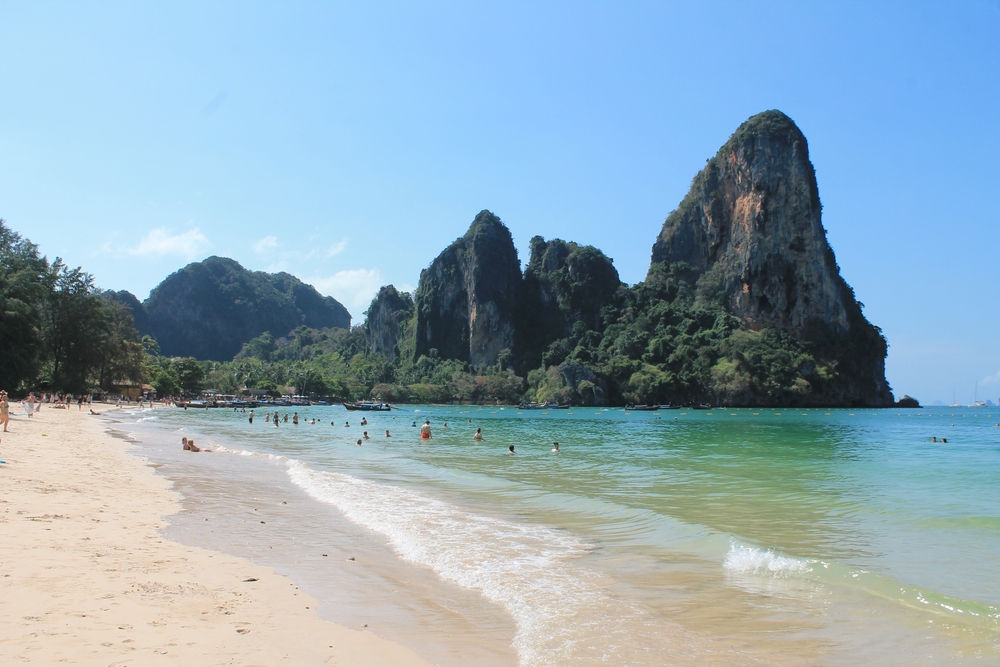 Stunning limestone cliffs and clear waters at Railay Beach, easily accessible by boat from Ao Nang Beach.