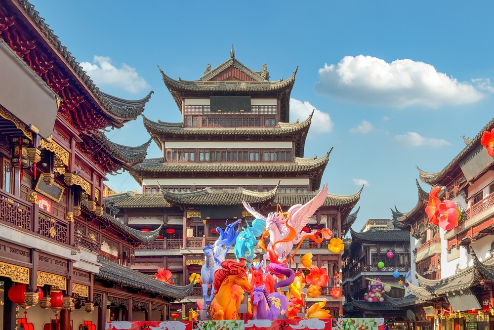 Traditional Chinese pavilions and vibrant decorations at Yu Garden in Shanghai, China.