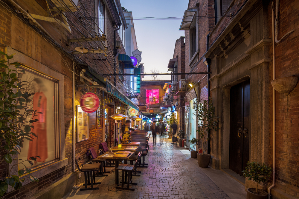 Narrow lanes lined with artist studios and cafes in the chic Tianzifang arts district in Shanghai.